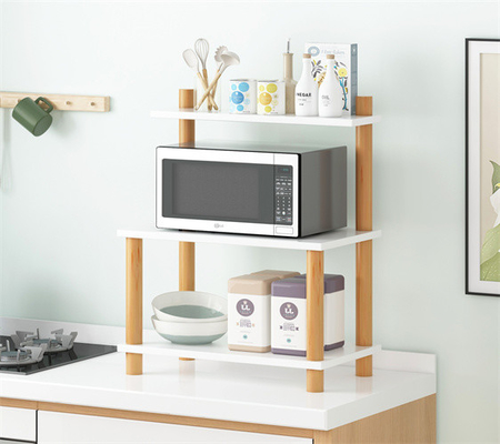 Le stockage en rayons assemblé par partie supérieure du comptoir à micro-ondes de cuisine rayonne la rangée 3