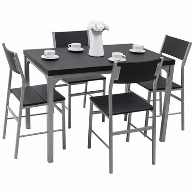 La table de salle à manger noire en bois à la maison a placé 4 chaises de Seater avec le cadre en métal